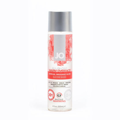 JO All-In-One Warm Embrace Sensual Massage Glide Silicone-Based 4 fl. oz (120ml) bottle. On the bottle 3 product feature icons for: 3 in 1 Massage glide - tatoo brightner - Skin conditioner; Massage Warming; 1 drop of JO = 10 drops of Massage Oils.