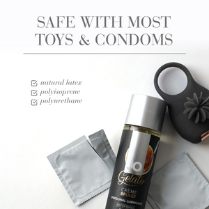 Safe with most toys & condoms: natural latex (checked); Polyisoprene (checked); Polyurethane (checked). In the lower part of the image is a JO Gelato Creme Brulee Personal Water Based Lubricant laying on its back in between two packets of unbranded condoms, the condom packet on the left is torn half way, and there is a sex toy above the bottle.