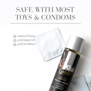 Safe with most toys & condoms: natural latex (checked); polyisoprene (checked); polyurethane (checked). on the right side of the image are non-branded condom packates the top is unopened, and the bottom has a tear opening. and laying on top is the Jo Gelato Salted Caramel Water Based lubricant bottle.