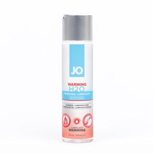 JO Warming H2O Personal Lubricant Water-Based 4 fl oz (120 ml) bottle. On the bottle are product feature icons for: Warming Formula; Lubricant Warming; Cleans Up easily with water - Rinse & Wipe.