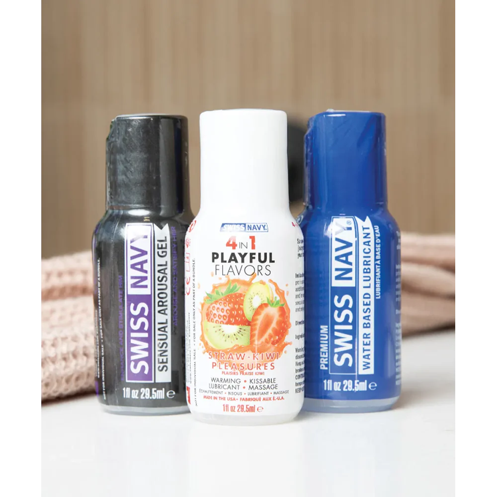 Three Swiss Navy products on a neutral background