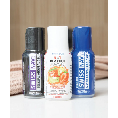 Three Swiss Navy products on a neutral background