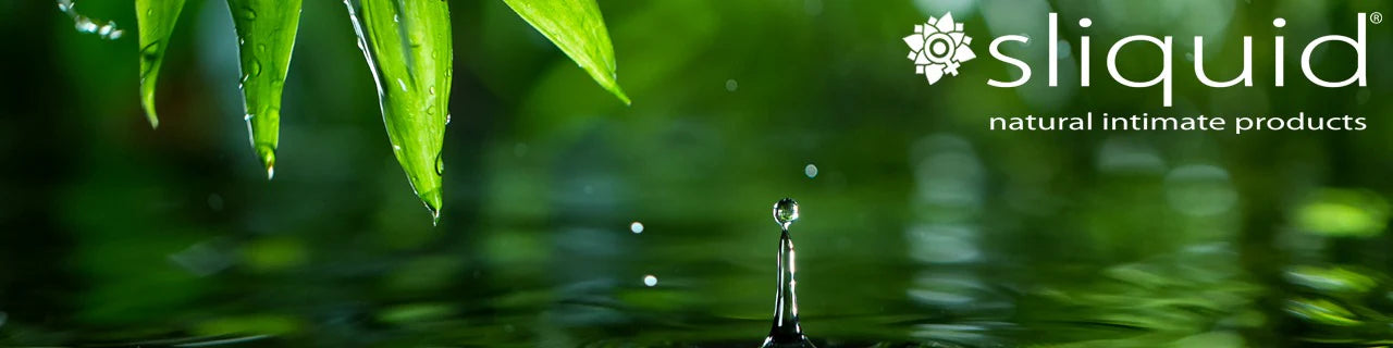 Banner for sliquid natural intimate products, with a close-up of a water drop in a pond.