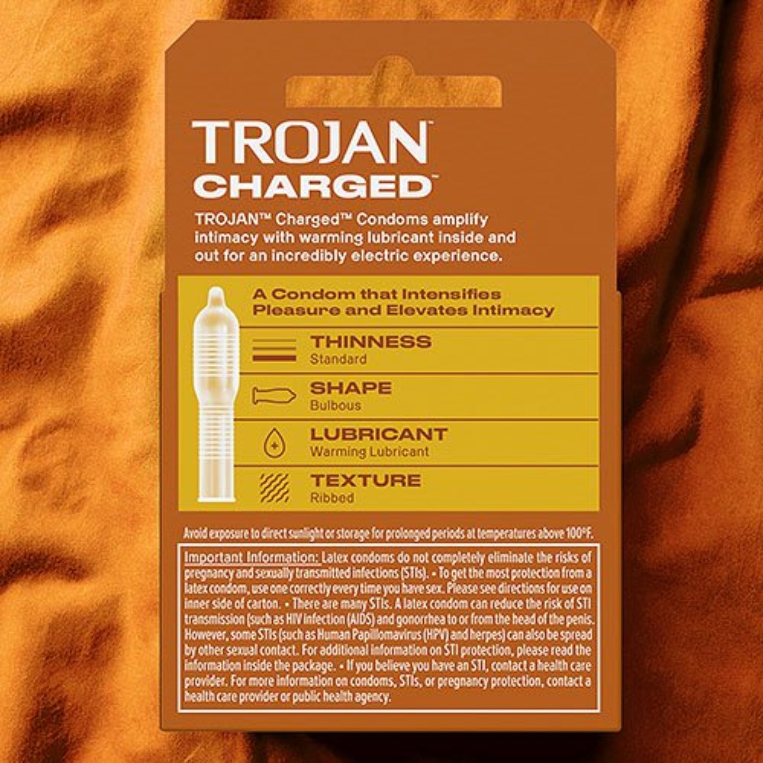 The back of a brown Trojan Charged condom package outlining standard thinness, bulbous shape, warming lubricant, and ribbed texture with important product and safety information below.