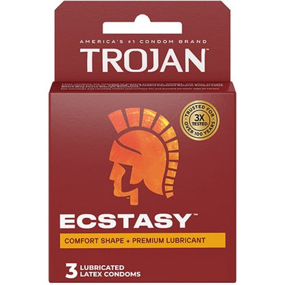 The front view of a deep red Trojan Ecstasy retail box package containing 3 lubricated latex condoms. The package features a large orange and yellow gradient Spartan profile logo, white typography reading "ECSTASY", a yellow banner text saying "COMFORT SHAPE + PREMIUM LUBRICANT", and a gold "3X Tested" security seal.
