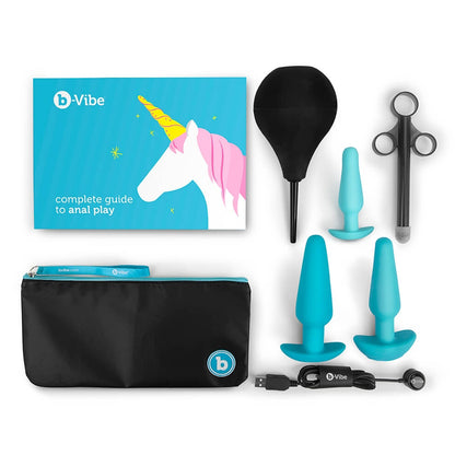 b-Vibe Complete Guide to Anal Play, b-Vibe Storage Bag, Anal enema, Lubricant Applicator, Small Silicone Butt Plug, Medium Rechargeable Vibrating Butt Plug, Large Weighted Butt Plug, and charging cable.