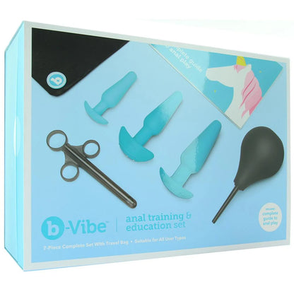 Front of the packaging for the b-Vibe Anal Training & Education Set. Packaging shows the included items: storage bag, b-Vibe Complete Guide to anal play, 3 various sized butt plugs, lubricant applicator, and the anal enema. On the bottom shows the b-Vibe logo, anal training & Education Set, product overview: 7-Piece Complete Set with Travel bag; Suitable for all user types; includes complete guide to anal play.