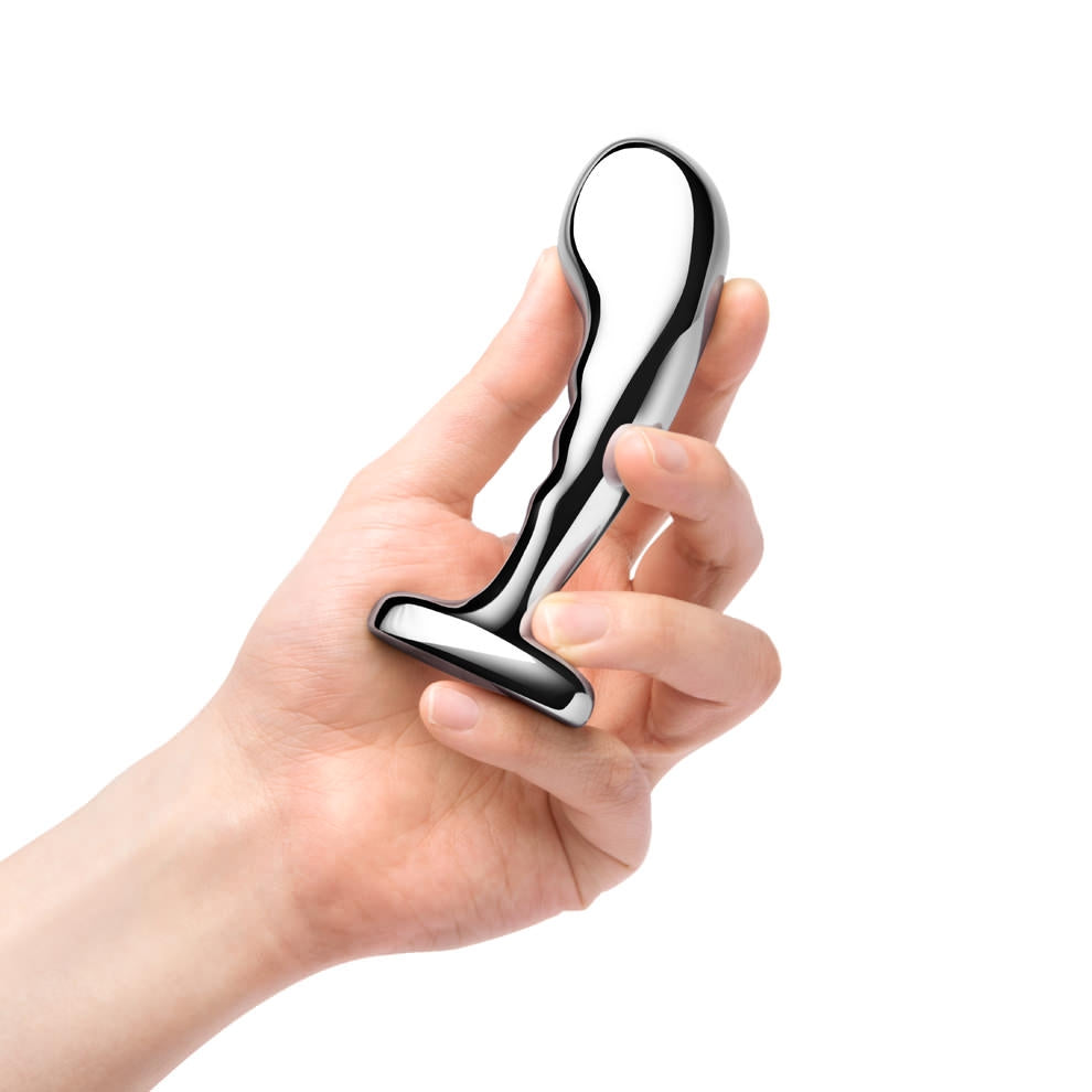 b-Vibe P-Spot Training Largest Anal Plug gently held, showing the size scale of the product.