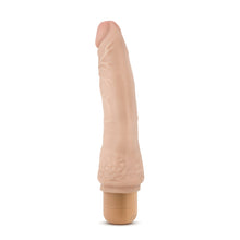 Load image into Gallery viewer, Bottom side of the blush Dr. Skin 21 cm / 8.5&quot; Cock Vibe 7, placed on its stand.