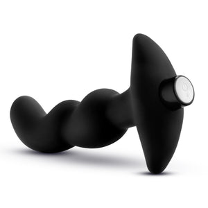 Back side of blush Anal Adventures Platinum Prostate Massager 3, with the power button,  and the charging port at the back of the product.