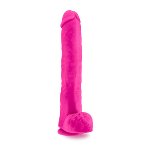 Back side of the blush Au Naturel Bold Daddy 14 Inches Dildo, placed on the suction cup.