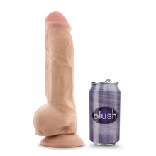 Load image into Gallery viewer, On the left side of the image is the blush Au Naturel Big Boy Dildo on the right side of the image is a regular sized pop can with the blush logo on it. The image represents a size scale of the product compared to the regular size can.