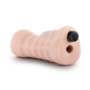 Back of the blush M for Men Sift + Wet 3-Pack Self-Lubricating Vibrating Stroker with a bullet vibrator inside.
