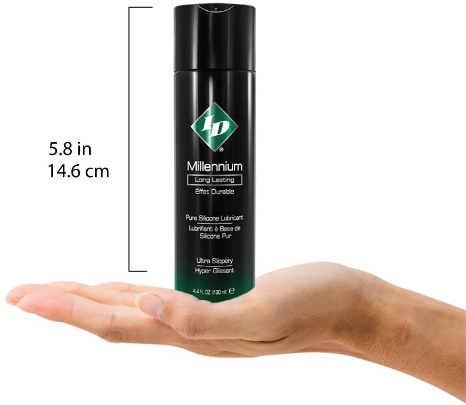 Size comparison for ID Millennium Long Lasting Pure Silicone Lubricant Ultra Slippery 4.4 fl. oz. (130 ml) compared to a human hand. The hight of the bottle is 5.8 inches or 14.6 centimetres.