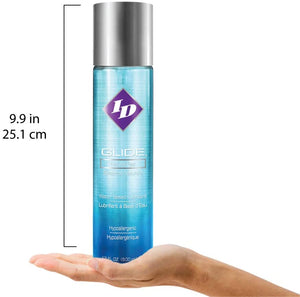 ID Glide Natural Feel Sensation Water-Based Lubricant Hypoallergenic 17 fl oz (500 ml) bottle height: 9.9 inches / 25.1 centimetres, standing on the palm of a hand for size reference.