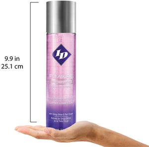 Size scale for ID Pleasure Tingling Sensation Water Based Lubricant with Ginko Biloba & Red Clover 17 fl oz (500 ml) comapred to a human hand. The height of the bottle is 9.9 inches or 25.1 centimetres.