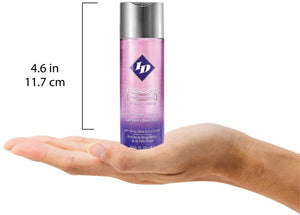 Size scale for ID Pleasure Tingling Sensation Water Based Lubricant with Ginko Biloba & Red Clover 2.2 fl oz (65 ml) compared to a human hand. The height od the bottle is 4.6 inches or 11.7 centimetres.