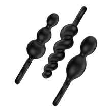 Load image into Gallery viewer, Satisfyer Booty Call Black Plugs placed diagonally side view.