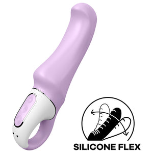 The Satisfyer Charming Smile Vibrator diagonally placed facing front side up, with the 3 control buttons visible on the handle, with the middle button being the power button, and the charging port visible from underneath. On the bottom right of the image is an icon for Silicone Flex.