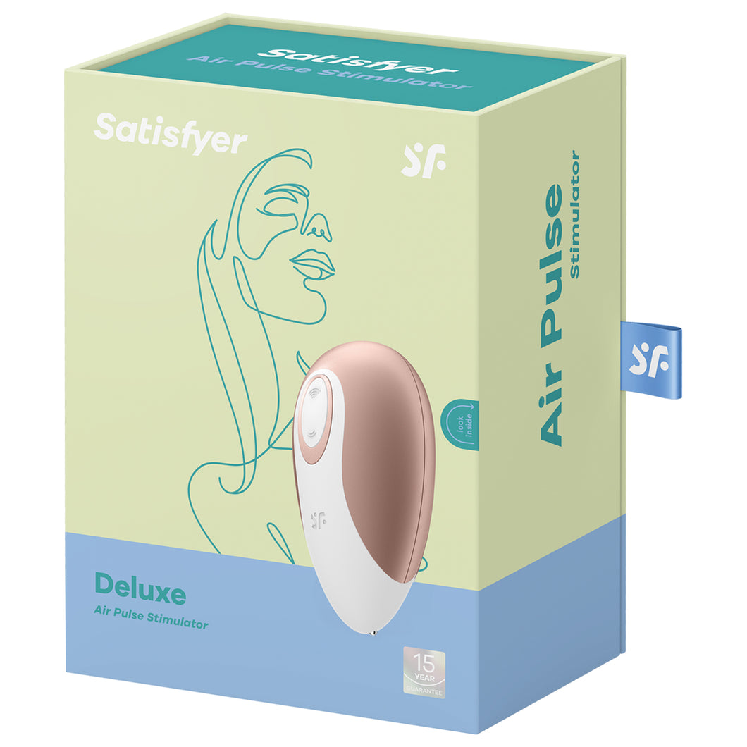 Front package of Satisfyer Deluxe Air Pulse Stimulator showing the Air Pulse Stimulator, and a 15 Year Manufacturer's Warranty. On the side of the package is written Air Pulse Stimulator with a tak displaying 