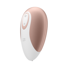 Load image into Gallery viewer, Top left of the Satisfyer Deluxe Air Pulse Stimulator With the controls visible on the top of the product, and the &quot;sf&quot; logo