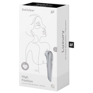 Front of the package for the Satisfyer High Fashion Luxury Air Pulse Stimulator + Vibration. On the left side is a diamond icon representing luxury, and on the right side is the Air Pulse Stimulator facing front side with the controls visible on the handle. 15 Yeah Guarantee icon is on the bottom right. On the right side of the package is written Luxury Air Pulse Stimulator + Vibration.