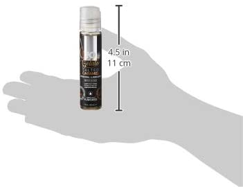 JO Gelato Salted Caramel Personal Water Based Lubricant bottle height: 4.5 inches / 11 centimtres. The bottle is placed on an illustrated hand showing the size scale of the bottle.