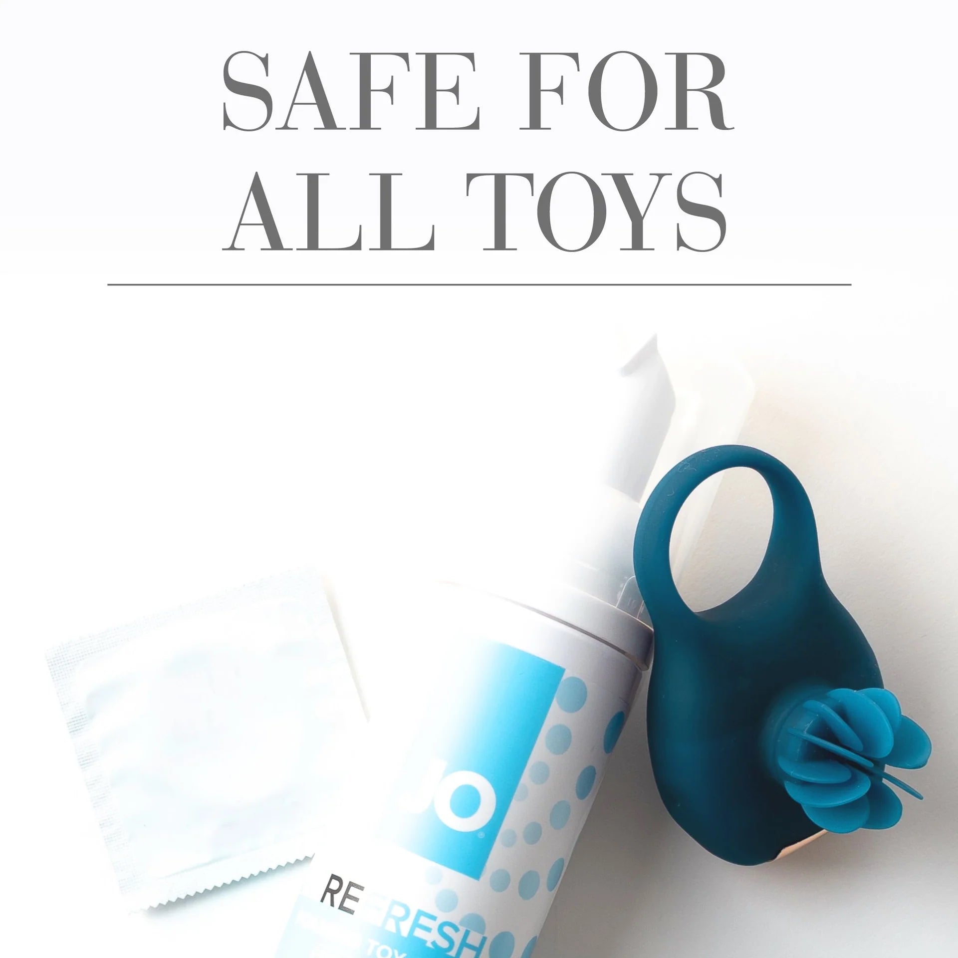 Safe for all toys a bottle of JO Refresh with an adult toy