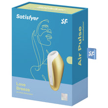 Load image into Gallery viewer, Front of the package for the Satisfyer Love Breeze Air Pulse Stimulator, on the right side is the yellow Love Breeze Stimulator facing the front with visible controls to the left, and on the bottom right is a 15 Year Guarantee mark. On the right side of the package is written Air Pulse Stimulator with a tag sticking out from the back with the SF logo on it.