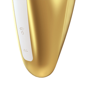 Close up on the controls for the yellow Satisfyer Love Breeze Air Pulse Stimulator, the control buttons are marked by two arching sound waves facing away from each other vertically, and the top wave button is also the power button.