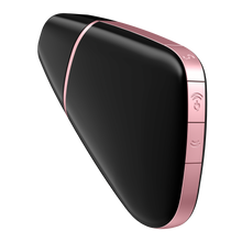 Load image into Gallery viewer, Back side view of the black Satisfyer Love Triangle Air Pulse Stimulator with the front cover on. On the back are three buttons, the first top is on the angle with an S on it, the middle button is the power button,and two arching air waves facing upward, and bellow is the third button with the arching air wave facing the opposite direction.
