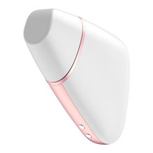 Load image into Gallery viewer, Front side of the white Satisfyer Love Triangle Air Pulse Stimulator with the front cover on. Charging port is visible on the bottom of the product.