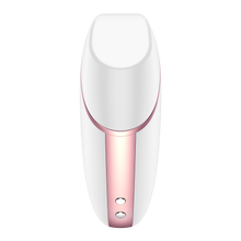 Load image into Gallery viewer, Front view from the bottom at the white Satisfyer Love Triangle Air Pulse Stimulator with the front cover on, and the charging port is visible at the bottom of the product.
