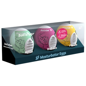 Front of the package of Satisfyer Masturbator Eggs displaying a set of Riffle, Bubble, and Fierce Masturbator Eggs. On the side of the package is written Satisfyer Masturbation Eggs.