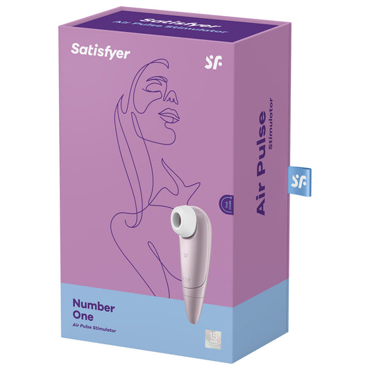 Front of the package for the Satisfyer Number One Air Pulse Stimulator, on the top of the package are the Satisfyer logos, on the left side is the Stimulator, with a 15 year guarantee mark on the bottom right. On the right side of the package is written Air Pulse Stimulator, with the SG tag sticking out from the back.