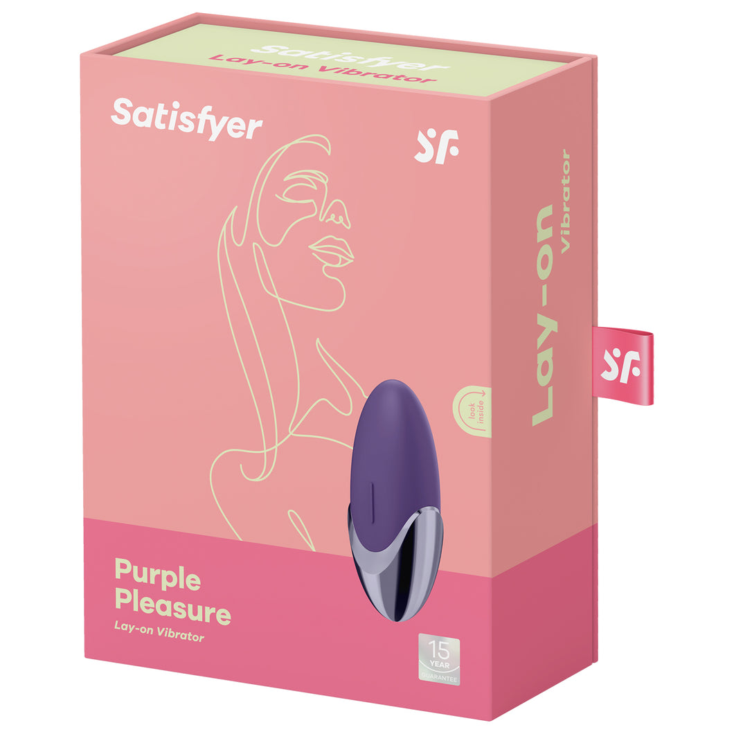 Front of the package from the top are the Satisfyer logos, on the bottom left is the product name Purple Pleasure Lay-on Vibrator, on the right side of the product facing up and to to the side, and on bottom right is the 15 year guarantee mark. On the right side of the package is written Lay-on Vibrator, and from the back is a tag with the SF logo sticking out.