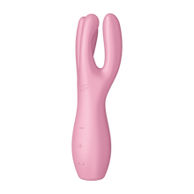 Load image into Gallery viewer, Front right side of the Satisfyer Threesome 3 Vibrator, on the top left on the product is engraved the SF, below are three control buttons -, +, and a horizontal wave.