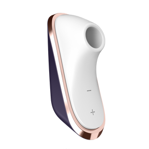 Front side of the Satisfyer Traveler Air Pulse Stimulator without the cover. On the bottom part of the product are the controls marked by - and +.
