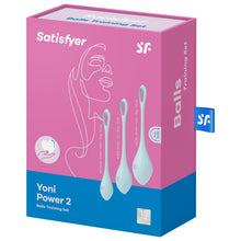 Load image into Gallery viewer, Front of the package from the top are the Satisfyer logos, on the bottom left is the product name Yoni Power 2 Balls Training Set. On the right side are the product (left to right): advanced: 20 mm / 0.8 in / 22 g / 0.8 oz; skilled: 25 mm / 1 in / 46 g / 1.6 oz; regular: 30 mm / 1.2 in / 74 g / 2.6 oz, the product are facing front side with the SF logo visible on the lower left of each kegel ball, and on the bottom right is a mark for 15 year guarantee.